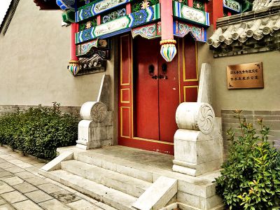 事業(yè)單位古建筑門口擺放漢白玉簡(jiǎn)約石抱鼓雕塑